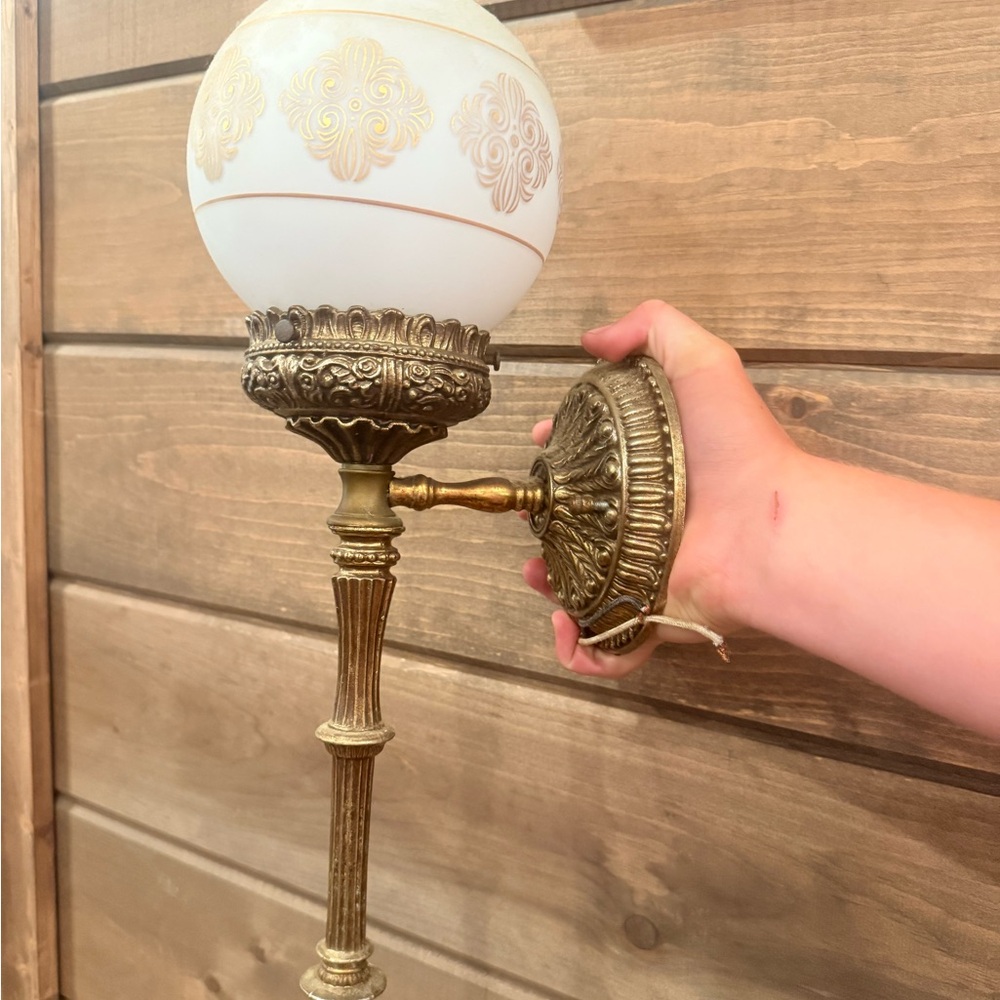 Ornate Brass Wall Sconce with White Glass Shade